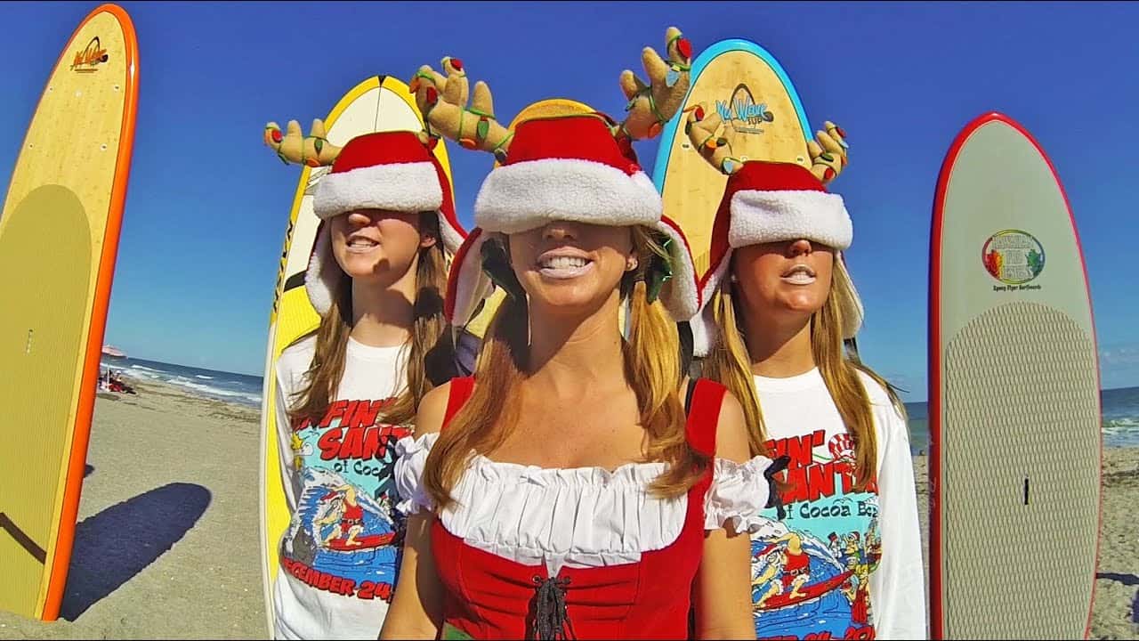 Surfing Santas En Cocoa Beach 